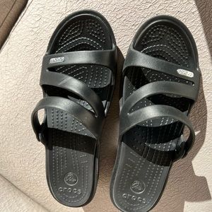 Size 7 Sandal, never worn with Silver Logo